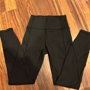Black Lululemon Invigorate leggings size 2 25 inseam